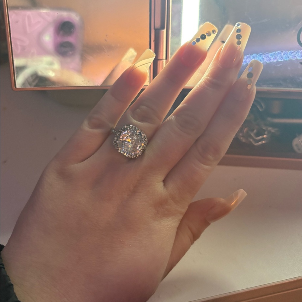 Elegant Rhinestone Ring with Nude Nails